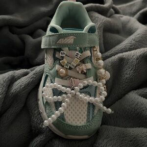 Place your Orders for Avia Kids' Mint Sneakers with Bead Charms.